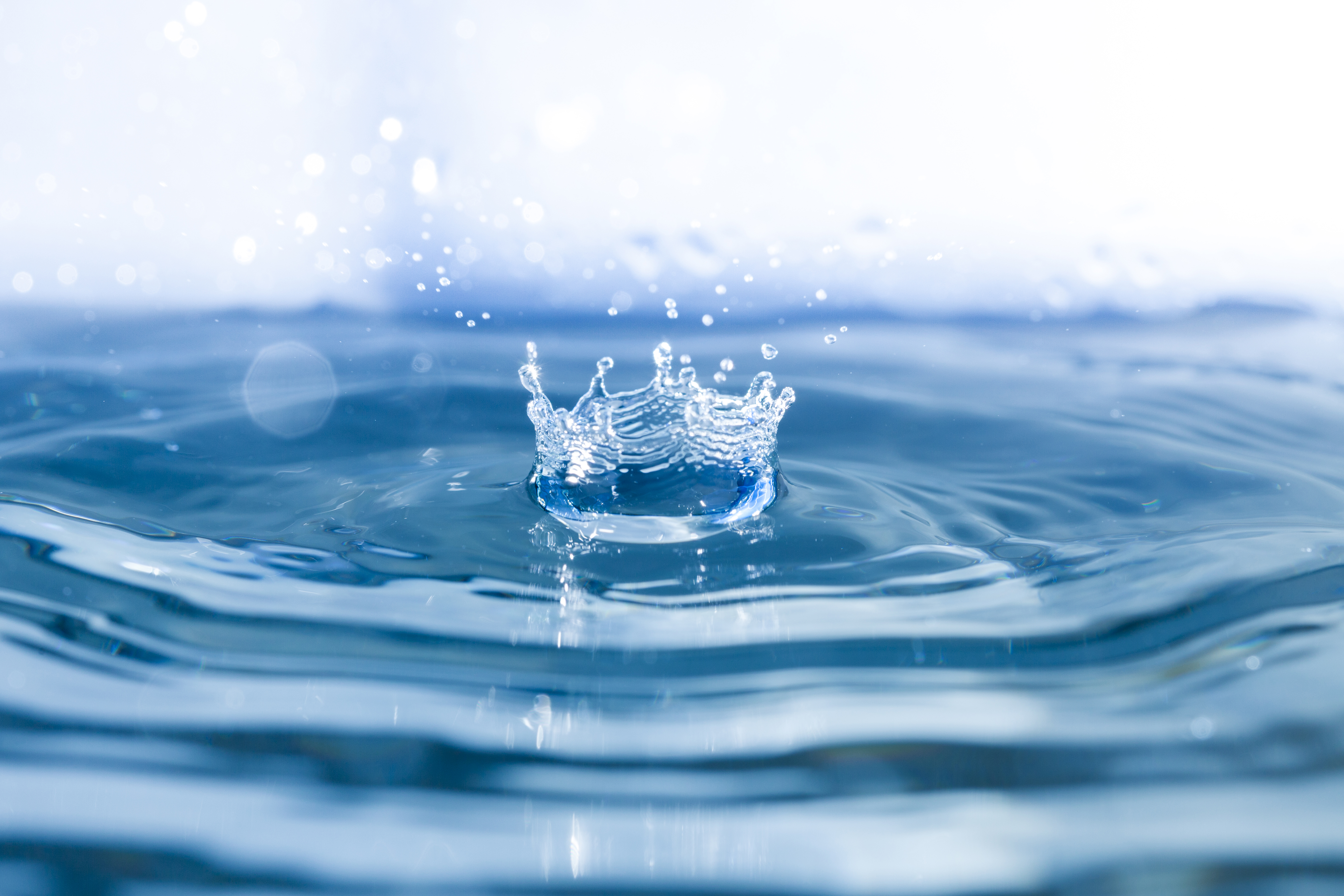 water-background-with-waves-and-drop-falling